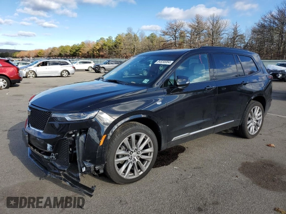 2021 Cadillac XT6 Sport z VIN 1GYKPGRS0MZ215942, wystawiony jako Copart lot #84830084 z przebiegiem 29 930 mil mil oraz Szkoda całkowita • Salvage title. Historia ofert i sprzedaży dostępna na DreamBid. Obrazek 1.