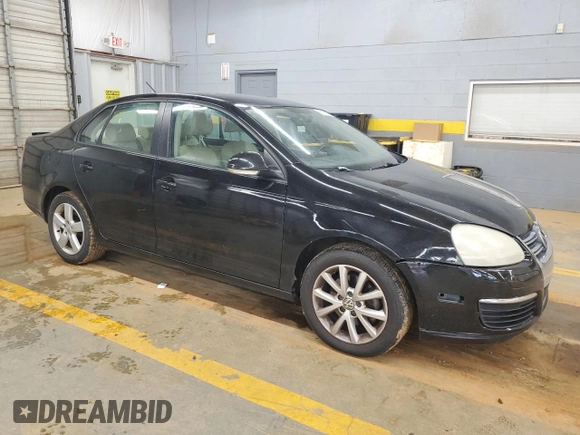 2010 Volkswagen Jetta Limited Edition with VIN 3VWAX7AJ4AM162032, listed as a Copart auction lot 56274115 with 164,642 mi miles and Salvage title. Bid and sale history available at DreamBid. Image 4.