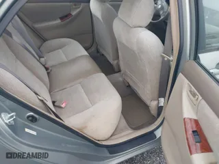 2004 Toyota Corolla CE with VIN 2T1BR32E24C309957, listed as a IAAI auction lot 41894304 with 299,999 mi miles. Bid and sale history available at carsss.com. Image 8.
