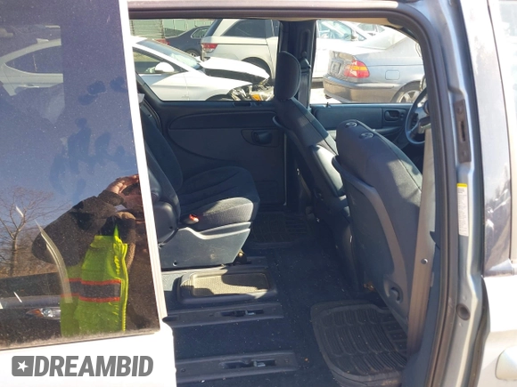 2003 Chrysler Town & Country LX with VIN 2C4GP44L73R238380, listed as a IAAI auction lot 41705420 with 129,225 mi miles and . Bid and sale history available at DreamBid. Image 8.