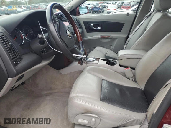 2006 Cadillac CTS with VIN 1G6DP577X60147354, listed as a Copart auction lot 73863824 with 76,606 mi miles and Salvage Title. Bid and sale history available at carsss.com. Image 7.