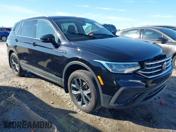 2023 Volkswagen Tiguan SE z VIN 3VVMB7AX7PM032629, wystawiony jako IAAI lot #41441468 z przebiegiem 52 518 mil mil oraz . Historia ofert i sprzedaży dostępna na DreamBid. Obrazek 1.