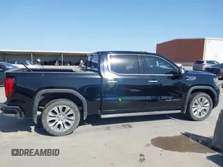 2020 GMC Sierra 1500 Denali with VIN 1GTU9FEL6LZ173499, listed as a IAAI auction lot 41856799 with 77,723 mi miles and . Bid and sale history available at DreamBid. Image 13.