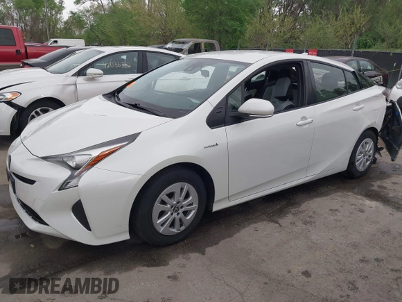 2017 Toyota Prius Two with VIN JTDKBRFUXH3036063, listed as a IAAI auction lot 42036676 with 202,873 mi miles. Bid and sale history available at carsss.com. Image 18.