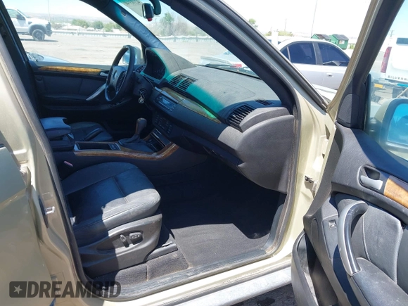 2000 BMW X5 with VIN WBAFB334XYLH02339, listed as a IAAI auction lot 42103940 with 115,355 mi miles. Bid and sale history available at carsss.com. Image 5.