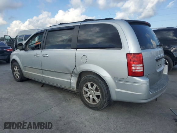 2010 Chrysler Town & Country Touring with VIN 2A4RR5DXXAR137658, listed as a Copart auction lot 72443994 with 101,934 mi miles and Salvage Title. Bid and sale history available at DreamBid. Image 2.
