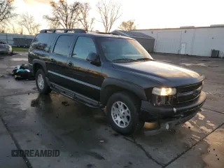 2001 Chevrolet Suburban LS z VIN 3GNFK16T91G221421, wystawiony jako Copart lot #87094634 z przebiegiem 186 977 mil mil oraz Szkoda całkowita • Salvage title. Historia ofert i sprzedaży dostępna na DreamBid. Obrazek 4.