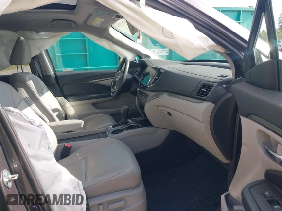2019 Honda Pilot EX-L with VIN 5FNYF6H52KB035504, listed as a IAAI auction lot 42642735 with 54,736 mi miles and . Bid and sale history available at DreamBid. Image 5.