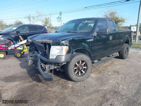 2014 Ford F-150 XL with VIN 1FTEX1CM4EKG06516, listed as a IAAI auction lot 41877641 with 202,729 mi miles. Bid and sale history available at carsss.com. Image 2.