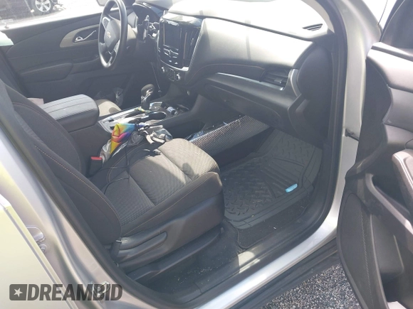 2021 Chevrolet Traverse LS with VIN 1GNERFKW3MJ200569, listed as a IAAI auction lot 42279102 with 73,783 mi miles and . Bid and sale history available at DreamBid. Image 5.