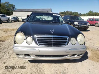 2000 Mercedes-Benz E-Class AWD with VIN WDBJF82JXYX035315, listed as a Copart auction lot 75568454 with 166,704 mi miles and Salvage Title. Bid and sale history available at carsss.com. Image 5.