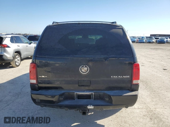 2003 Cadillac Escalade z VIN 1GYEC63T63R317510, wystawiony jako Copart lot #48515195 z przebiegiem 398 303 mil mil oraz Czysty tytuł • Clean title. Historia ofert i sprzedaży dostępna na DreamBid. Obrazek 6.