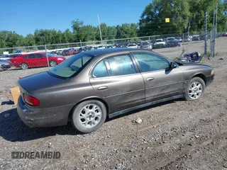 2001 Oldsmobile Intrigue GX z VIN 1G3WH52H11F148269, wystawiony jako IAAI lot #42238449 z przebiegiem Nie podano mil oraz . Historia ofert i sprzedaży dostępna na DreamBid. Obrazek 4.