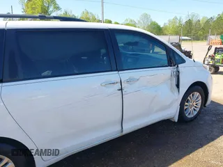 2014 Toyota Sienna XLE z VIN 5TDYK3DC7ES431782, wystawiony jako IAAI lot #41975182 z przebiegiem 191 870 mil mil oraz . Historia ofert i sprzedaży dostępna na DreamBid. Obrazek 18.