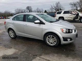 2014 Chevrolet Sonic LT with VIN 1G1JC5SHXE4143722, listed as a Copart auction lot 50823675 with 77,985 mi miles and Salvage Title. Bid and sale history available at carsss.com. Image 4.