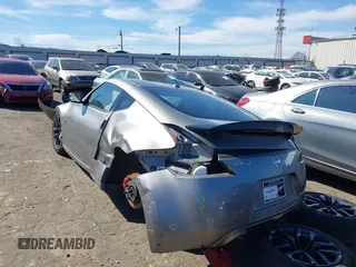 2009 Nissan 370Z Touring z VIN JN1AZ44E19M402223, wystawiony jako IAAI lot #41715048 z przebiegiem 89 123 mil mil oraz . Historia ofert i sprzedaży dostępna na DreamBid. Obrazek 3.
