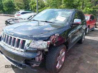 2013 Jeep Grand Cherokee Overland with VIN 1C4RJECT3DC526005, listed as a IAAI auction lot 42064151 with 112,777 mi miles and . Bid and sale history available at DreamBid. Image 2.