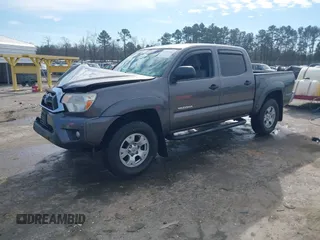 2015 Toyota Tacoma PreRunner z VIN 5TFJX4GN9FX039498, wystawiony jako IAAI lot #41487344 z przebiegiem 135 061 mil mil oraz . Historia ofert i sprzedaży dostępna na DreamBid. Obrazek 2.