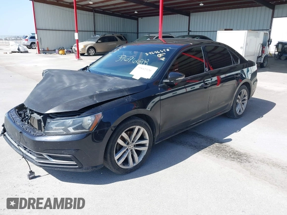 2019 Volkswagen Passat 2.0T Wolfsburg Edition with VIN 1VWLA7A30KC009646, listed as a IAAI auction lot 39842320 with 101,006 mi miles. Bid and sale history available at carsss.com. Image 18.