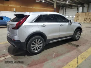 2020 Cadillac XT4 AWD Premium Luxury with VIN 1GYFZDR40LF055380, listed as a Copart auction lot 43933755 with 54,646 mi miles and Salvage Title. Bid and sale history available at DreamBid. Image 3.