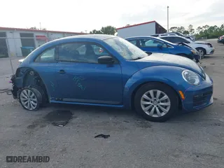2018 Volkswagen Beetle S with VIN 3VWFD7AT5JM710121, listed as a IAAI auction lot 41264655 with 37,871 mi miles. Bid and sale history available at carsss.com. Image 13.