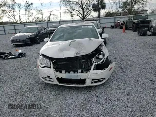2008 Volkswagen Eos Turbo z VIN WVWBA71F88V039175, wystawiony jako Copart lot #88579725 z przebiegiem 89 414 mil mil oraz Szkoda całkowita • Salvage title. Historia ofert i sprzedaży dostępna na DreamBid. Obrazek 11.