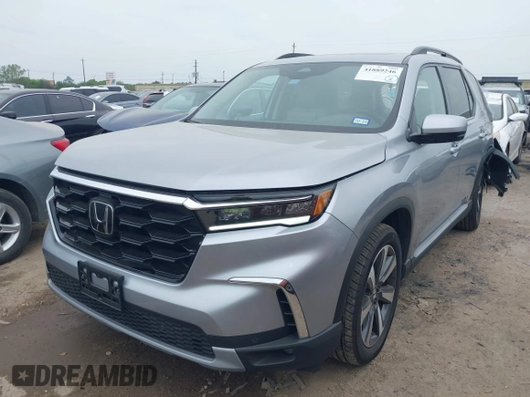 2023 Honda Pilot Touring with VIN 5FNYG2H75PB014662, listed as a IAAI auction lot 41889246 with 14,413 mi miles. Bid and sale history available at carsss.com. Image 17.