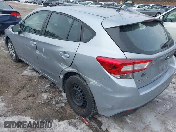 2018 Subaru Impreza with VIN 4S3GTAA65J1740704, listed as a IAAI auction lot 41723889 with 53,679 mi miles. Bid and sale history available at carsss.com. Image 3.