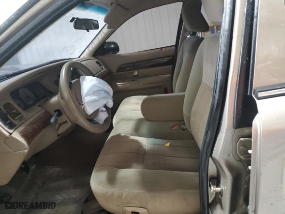 2005 Mercury Grand Marquis GS with VIN 2MEFM74W35X617440, listed as a Copart auction lot 70248644 with 202,330 mi miles and Salvage Title. Bid and sale history available at carsss.com. Image 7.