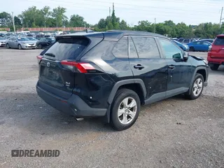 2021 Toyota RAV4 XLE with VIN 2T3P1RFV5MW228015, listed as a IAAI auction lot 42613804 with 28,028 mi miles and . Bid and sale history available at DreamBid. Image 4.