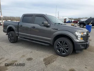 2015 Ford F-150 XLT with VIN 1FTEW1E87FFC44971, listed as a Copart auction lot 51836635 with 206,184 mi miles and Salvage Title. Bid and sale history available at DreamBid. Image 4.