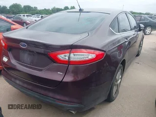 2013 Ford Fusion SE with VIN 3FA6P0H72DR274982, listed as a IAAI auction lot 42050722 with 219,247 mi miles. Bid and sale history available at carsss.com. Image 4.