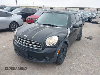 2015 MINI Countryman with VIN WMWZB3C53FWR43819, listed as a IAAI auction lot 41610007 with 134,185 mi miles and . Bid and sale history available at DreamBid. Image 2.