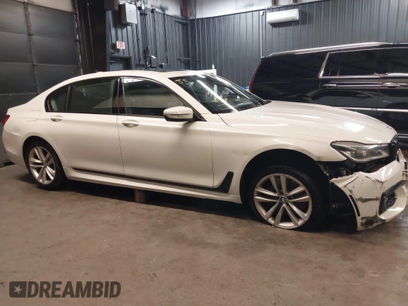 2016 BMW 7 Series 750i xDrive with VIN WBA7F2C59GG419656, listed as a IAAI auction lot 42118092 with 108,560 mi miles and . Bid and sale history available at DreamBid. Image 12.