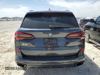 2022 BMW X5 xDrive45e with VIN 5UXTA6C0XN9M79182, listed as a Copart auction lot 48599195 with 31,219 mi miles and Salvage Title. Bid and sale history available at carsss.com. Image 6.
