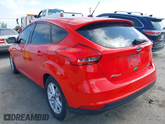 2015 Ford Focus SE with VIN 1FADP3K25FL233415, listed as a IAAI auction lot 42074326 with 213,246 mi miles. Bid and sale history available at carsss.com. Image 3.