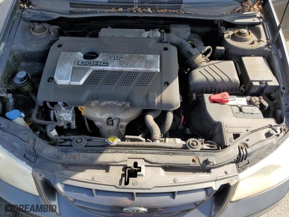 2006 Kia Spectra EX with VIN KNAFE122X65270684, listed as a Copart auction lot 73002454 with 79,326 mi miles and Salvage Title. Bid and sale history available at carsss.com. Image 11.