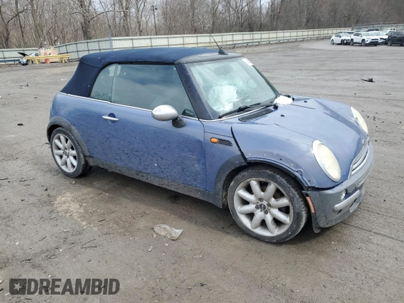 2005 MINI Convertible z VIN WMWRF33435TF60350, wystawiony jako Copart lot #50545005 z przebiegiem 91 078 mil mil oraz Szkoda całkowita • Salvage title. Historia ofert i sprzedaży dostępna na DreamBid. Obrazek 4.