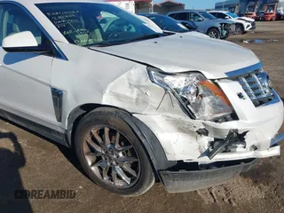 2013 Cadillac SRX Premium Collection with VIN 3GYFNJE32DS644094, listed as a IAAI auction lot 42513106 with 122,572 mi miles and . Bid and sale history available at DreamBid. Image 6.