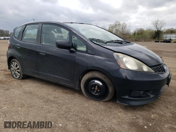 2013 Honda Fit Sport with VIN JHMGE8H51DC009050, listed as a Copart auction lot 53913855 with 207,199 mi miles and Salvage Title. Bid and sale history available at carsss.com. Image 4.