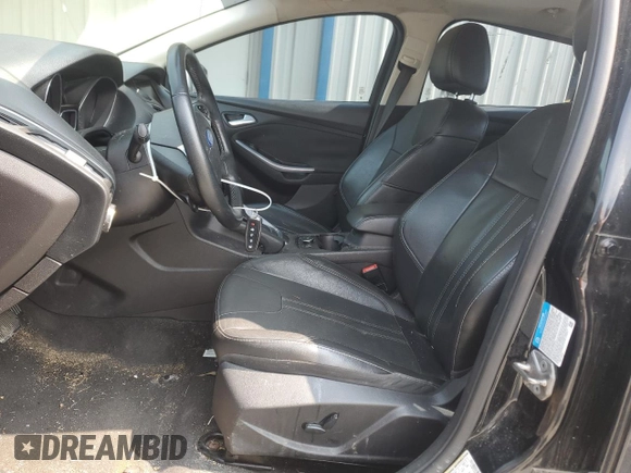 2014 Ford Focus Titanium with VIN 1FADP3J20EL347435, listed as a Copart auction lot 54947345 with 144,169 mi miles and Salvage title. Bid and sale history available at DreamBid. Image 7.