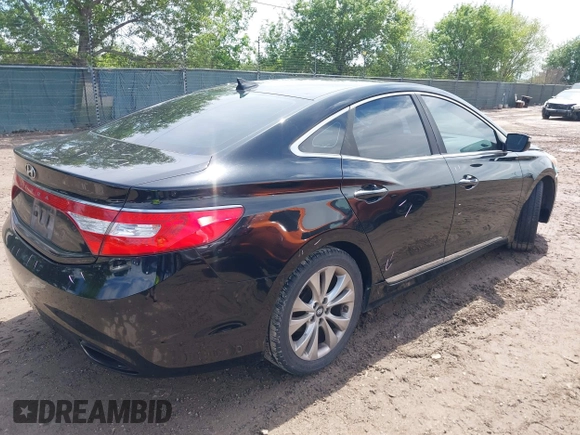2014 Hyundai Azera with VIN KMHFG4JG3EA354276, listed as a IAAI auction lot 41892879 with 114,147 mi miles and . Bid and sale history available at carsss.com. Image 4.