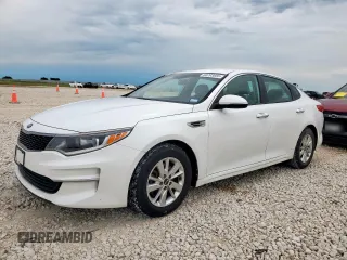 2016 Kia Optima LX z VIN KNAGT4L34G5077497, wystawiony jako Copart lot #60293855 z przebiegiem 107 003 mil mil oraz Czysty tytuł • Clean title. Historia ofert i sprzedaży dostępna na DreamBid. Obrazek 1.