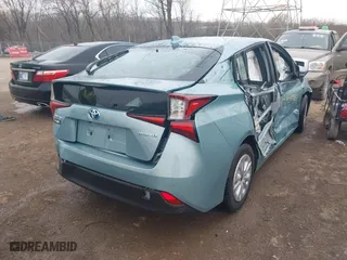 2022 Toyota Prius L Eco with VIN JTDKAMFU4N3164963, listed as a IAAI auction lot 41859931 with 5,118 mi miles. Bid and sale history available at carsss.com. Image 4.