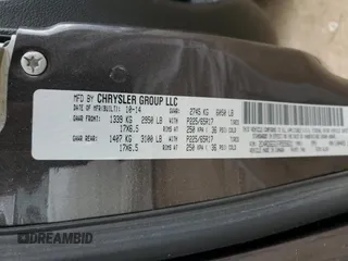 2015 Dodge Grand Caravan R/T with VIN 2C4RDGEG1FR555631, listed as a Copart auction lot 51119015 with 145,844 mi miles and Salvage Title. Bid and sale history available at DreamBid. Image 14.