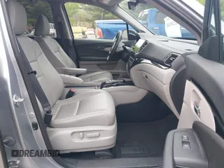 2020 Honda Pilot Touring 8-Passenger z VIN 5FNYF6H91LB042626, wystawiony jako IAAI lot #42249440 z przebiegiem 57 429 mil mil oraz . Historia ofert i sprzedaży dostępna na DreamBid. Obrazek 5.