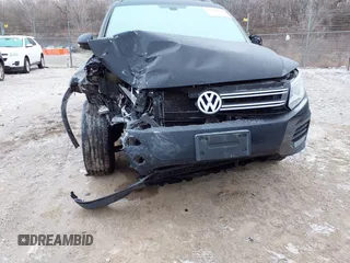 2017 Volkswagen Tiguan S with VIN WVGBV7AX8HK027148, listed as a IAAI auction lot 41215649 with 132,690 mi miles and . Bid and sale history available at DreamBid. Image 18.