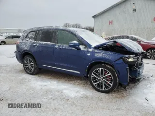 2024 Cadillac XT6 AWD Sport with VIN 1GYKPGRS4RZ734578, listed as a Copart auction lot 88603575 with 9,015 mi miles and Salvage Title. Bid and sale history available at carsss.com. Image 4.