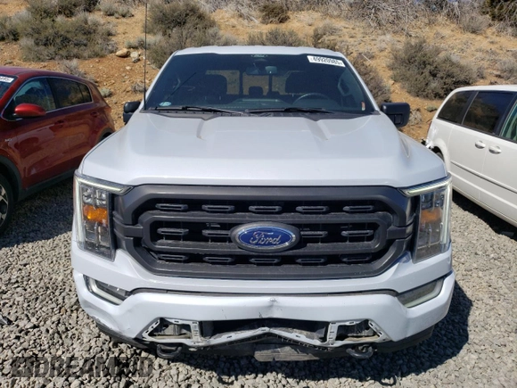 2022 Ford F-150 XL with VIN 1FTFW1E83NKE70208, listed as a Copart auction lot 49920985 with 20,745 mi miles and Salvage Title. Bid and sale history available at carsss.com. Image 5.