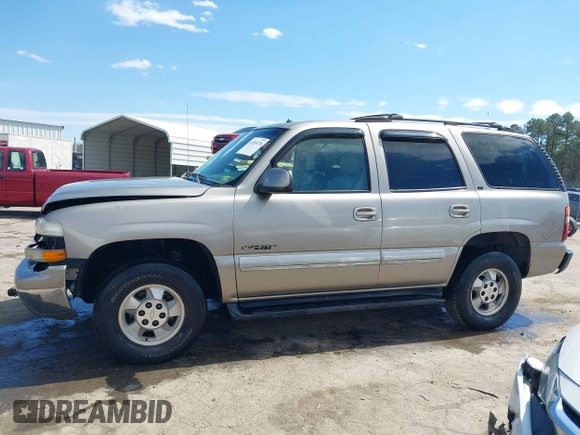 2002 Chevrolet Tahoe Z71 with VIN 1GNEK13Z32R237152, listed as a IAAI auction lot 41855170 with 141,637 mi miles. Bid and sale history available at carsss.com. Image 14.